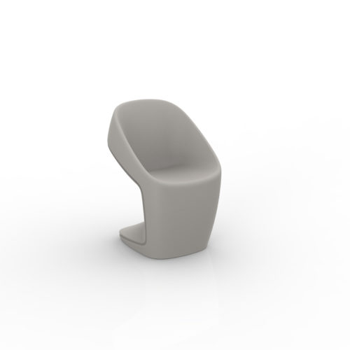 A UFO dining chair by Vondom in ecru.