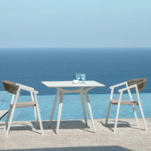 2 Key Dining Armchairs by Talenti by the sea.