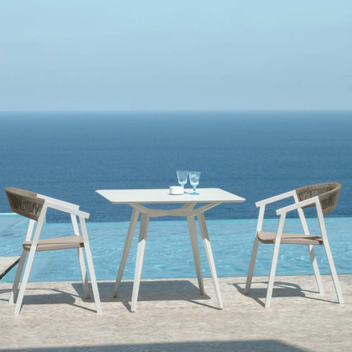 2 Key Dining Armchairs by Talenti by the sea.