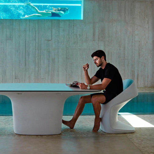A UFO dining chair in use.