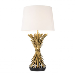 Table Lamp Bonheur by Eichholtz painted in brass colour with black granite base and white lampshade. Features a wheat sheaf sculptured from iron with antique gold finish