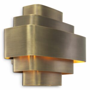 Wall Lamp Pegaso by Eichholtz with curved shapes in a vintage brass finish