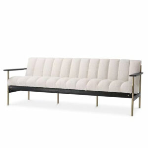 Designer luxurious Sofa Elan by Eichholtz in boucle cream upholstery finish with brushed brass and black finish. Features deep-channel stitching