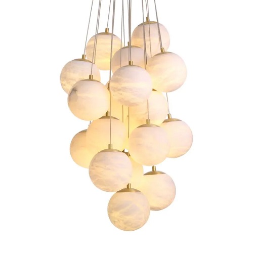 Designer Chandelier Sphinx L by Eichholtz in antique brass finish with alabaster spheres