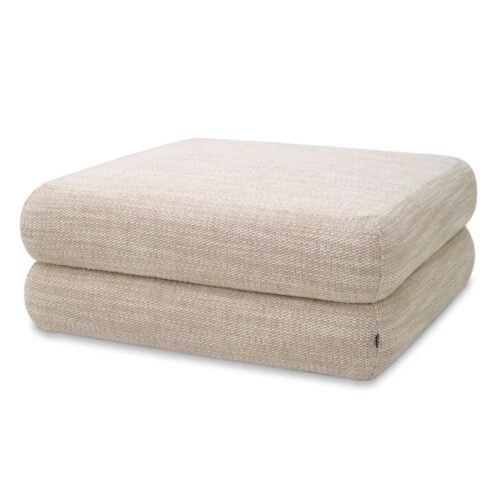 Luxurious Malaga Modular Sofa - Ottoman by Eichholtz in skyward sand fabric with black feet.